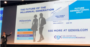 Jason Dorsey on a stage presenting a slide that shows the Millennial generational divide