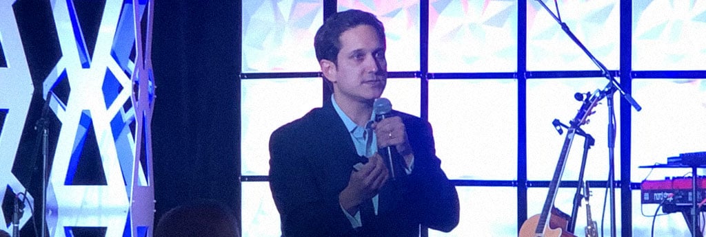 Generational Speaker Jason Dorsey giving an in-person presentation on a stage
