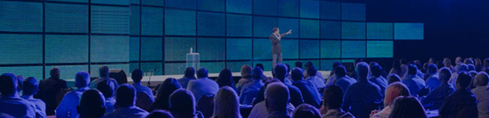 From Executive Retreats to In-Depth Insights Webinars and Online Learning - Jason Dorsey on stage presenting to large crowd.